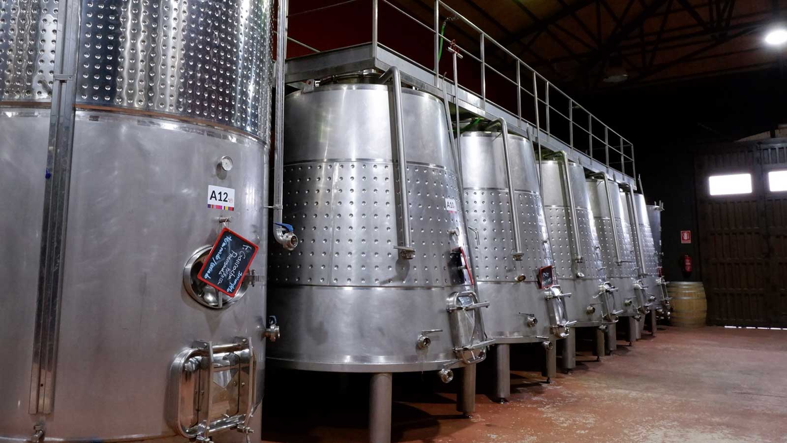 Stainless steel fermenting tanks in a winery