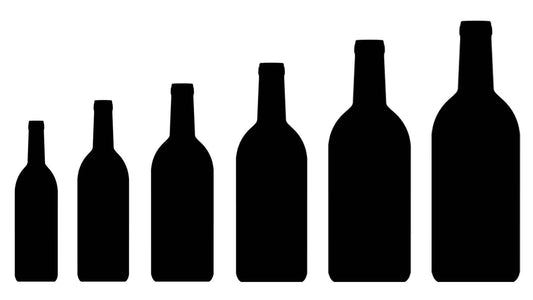 silhouettes of different sized wine bottles