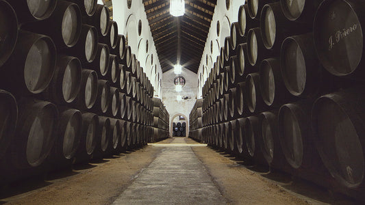Barrels in the cellar at Spanish wine producer Bodegas Juan Piñero